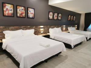 Voodi või voodid majutusasutuse L Hotel toas