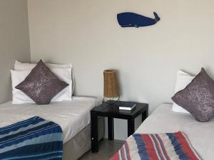 Letto o letti in una camera di Crayfish Creek