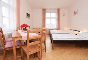 Posteľ alebo postele v izbe v ubytovaní Flamingo Apartments