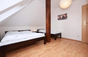 Posteľ alebo postele v izbe v ubytovaní Flamingo Apartments