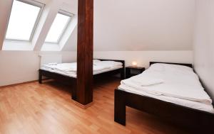Posteľ alebo postele v izbe v ubytovaní Flamingo Apartments
