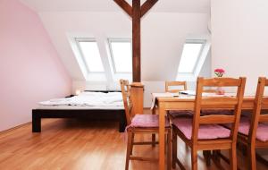 Posteľ alebo postele v izbe v ubytovaní Flamingo Apartments