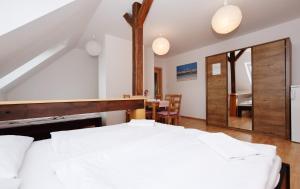 Posteľ alebo postele v izbe v ubytovaní Flamingo Apartments