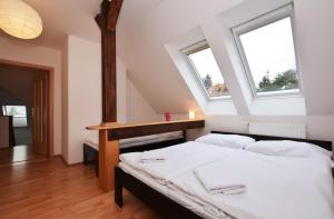 Posteľ alebo postele v izbe v ubytovaní Flamingo Apartments