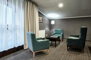 Posezení v ubytování Optima Collection Park Hotel Ivano-Frankivsk