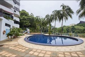 Kolam renang di atau dekat dengan Susie's Resort Seaview Suites at Sri Sayang