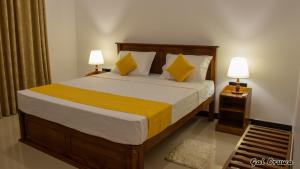 Postel nebo postele na pokoji v ubytování Gal Oruwa Resort