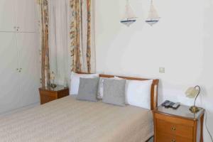 Postel nebo postele na pokoji v ubytování Yianiskari Holiday House
