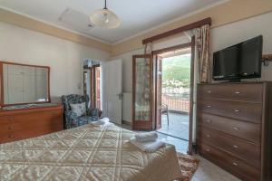 Postel nebo postele na pokoji v ubytování Yianiskari Holiday House