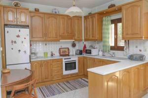 Kuchyň nebo kuchyňský kout v ubytování Yianiskari Holiday House