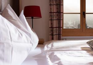 Voodi või voodid majutusasutuse Hotel Kernen toas