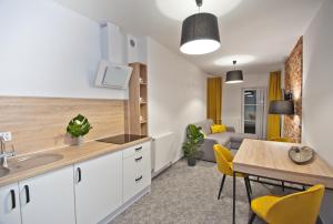 Kuchnia lub aneks kuchenny w obiekcie ApartHOTEL Gostyń