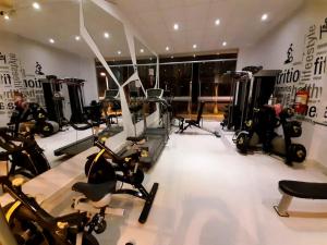 a gym with a bunch of exercise bikes in a room at DPTO Ejecutivo en PIURA 1 HAB in Piura