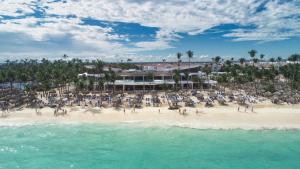 an aerial view of a beach with a crowd of people at Bahia Principe Luxury Ambar - Adults Only All Inclusive in Punta Cana