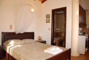Postel nebo postele na pokoji v ubytování Corfu Maisonettes Anemouri - San George Apartments