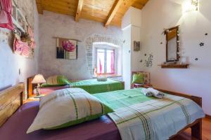 Posteľ alebo postele v izbe v ubytovaní Beautiful villa Loreta with private pool near Pula and Rovinj + 37 fotografií