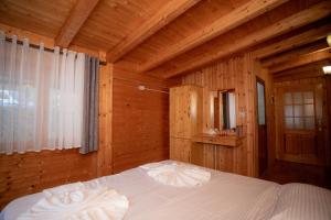 Hotel Shpija e Gjyshit客房内的一张或多张床位