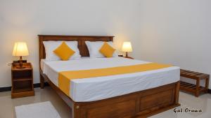 Postel nebo postele na pokoji v ubytování Gal Oruwa Resort