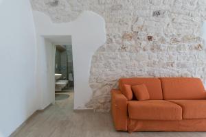 A seating area at Le Piccole Case Bianche