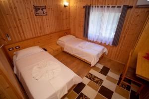 Hotel Shpija e Gjyshit客房内的一张或多张床位