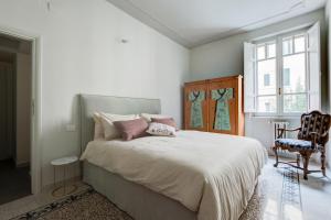 Posteľ alebo postele v izbe v ubytovaní Casa Satrico