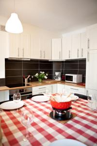 Кухня або міні-кухня у Appartement Le Lutetia