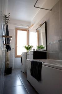 Ванна кімната в Appartement Le Lutetia