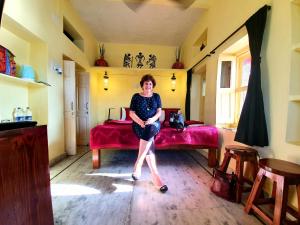 Oolala - Your lake house in the center of Udaipur客房内的一张或多张床位