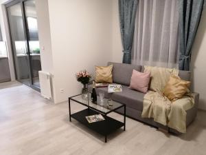 Posezení v ubytování Prima Family Apartments