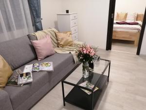 Postel nebo postele na pokoji v ubytování Prima Family Apartments