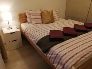 Postel nebo postele na pokoji v ubytování Prima Family Apartments