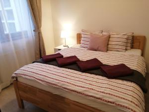 Postel nebo postele na pokoji v ubytování Prima Family Apartments