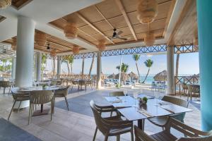 Un restaurante o sitio para comer en Bahia Principe Grand Punta Cana - All Inclusive