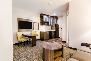 A seating area at Candlewood Suites West Edmonton - Mall Area, an IHG Hotel