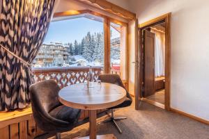 Χώρος καθιστικού στο Hôtel Les Sherpas