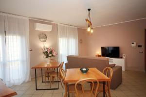 Televízia a/alebo spoločenská miestnosť v ubytovaní B&B Capuam Vetere Accommodation