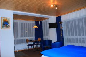 Lova arba lovos apgyvendinimo įstaigoje Hotel Alpha