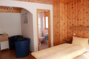 Lova arba lovos apgyvendinimo įstaigoje Hotel Alpha