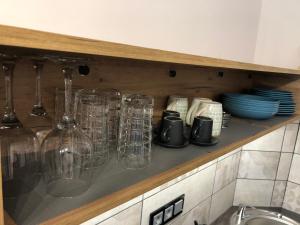 Kuchyň nebo kuchyňský kout v ubytování IL-LAK Apartman
