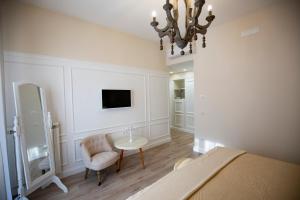 TV a/nebo společenská místnost v ubytování Twins House Sorrento