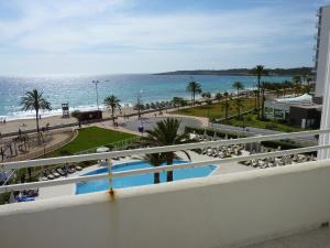 a view of the ocean from the balcony of a resort at FeWo Mallorca-ideal - Mercedes in Cala Millor