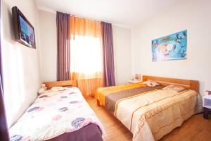 Voodi või voodid majutusasutuse Apartment in Hotel toas