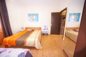Voodi või voodid majutusasutuse Apartment in Hotel toas