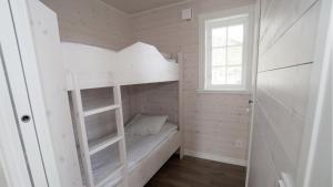 Ein Bett oder Betten in einem Zimmer der Unterkunft Jarvso House. Ski In / Ski Out.
