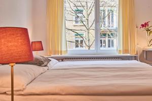 Ένα ή περισσότερα κρεβάτια σε δωμάτιο στο Saint Georges Hotel