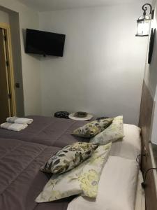 Posteľ alebo postele v izbe v ubytovaní La posada del Cani