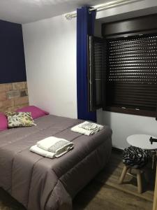 Posteľ alebo postele v izbe v ubytovaní La posada del Cani
