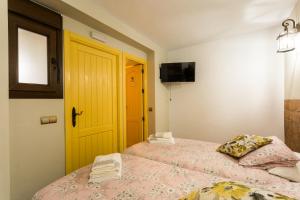 Posteľ alebo postele v izbe v ubytovaní La posada del Cani