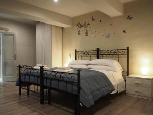 Voodi või voodid majutusasutuse Hotel Santa Croce toas