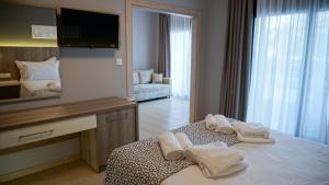 Posteľ alebo postele v izbe v ubytovaní Agnes Deluxe Hotel